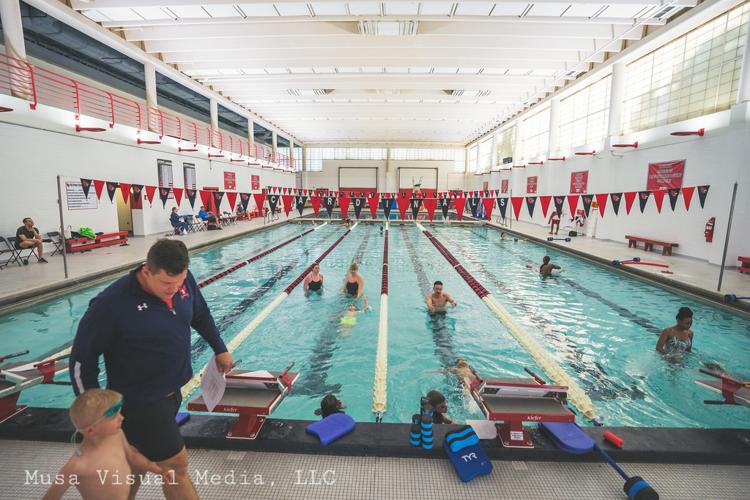 Coach Sean Emery on the pool deck during an adult lesson at Old City Swim School