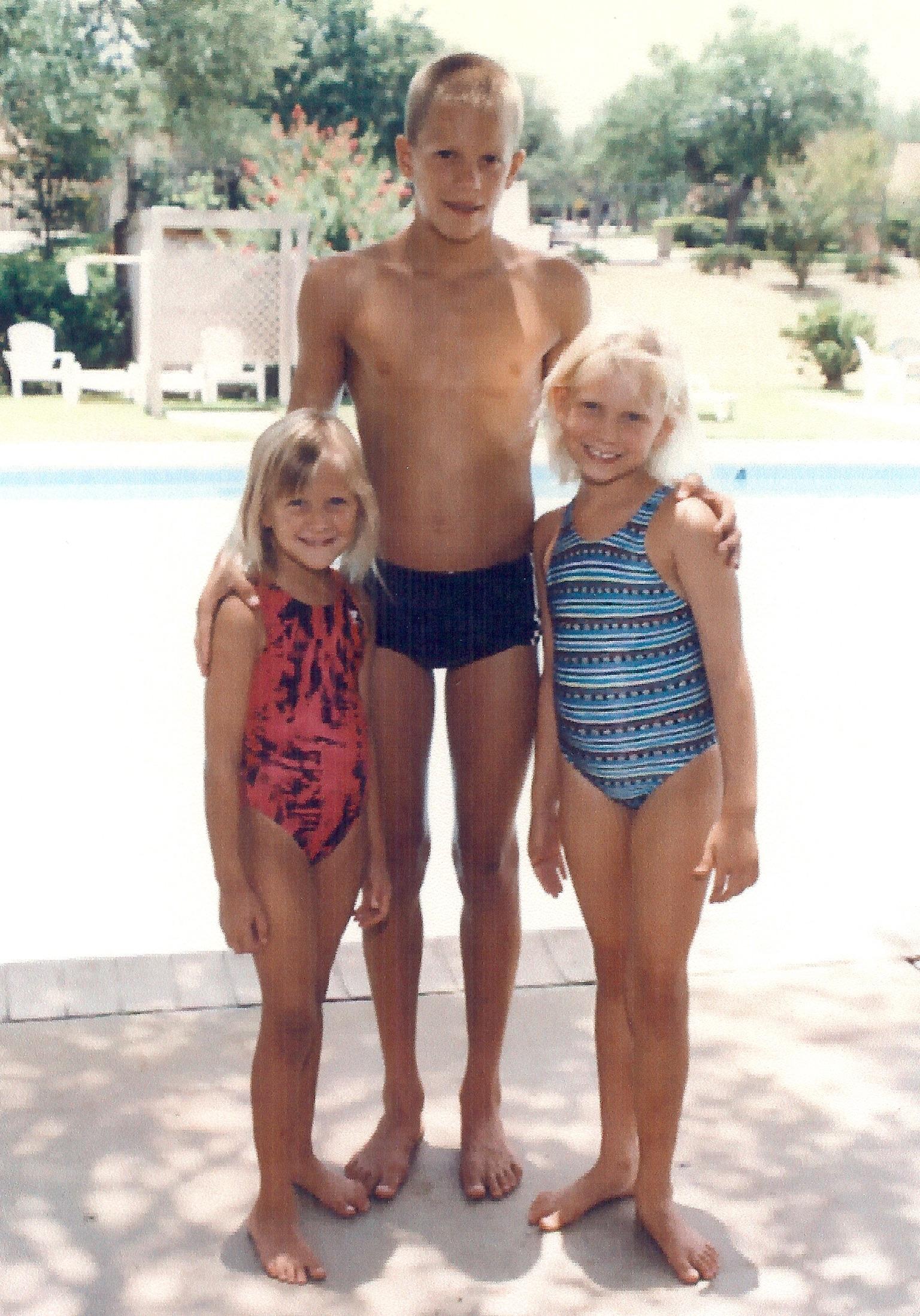 Young Sean with his sisters at the pool
