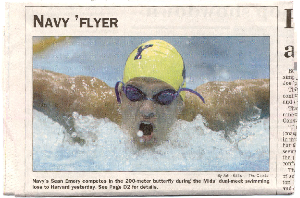 Newspaper clipping — Sean Emery competing in the 200-meter butterfly for Navy